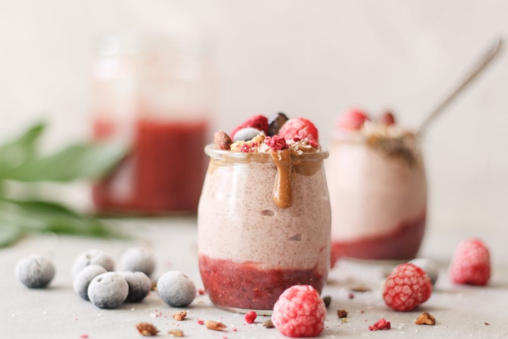raspberry blueberry cacao smoothies in glass 